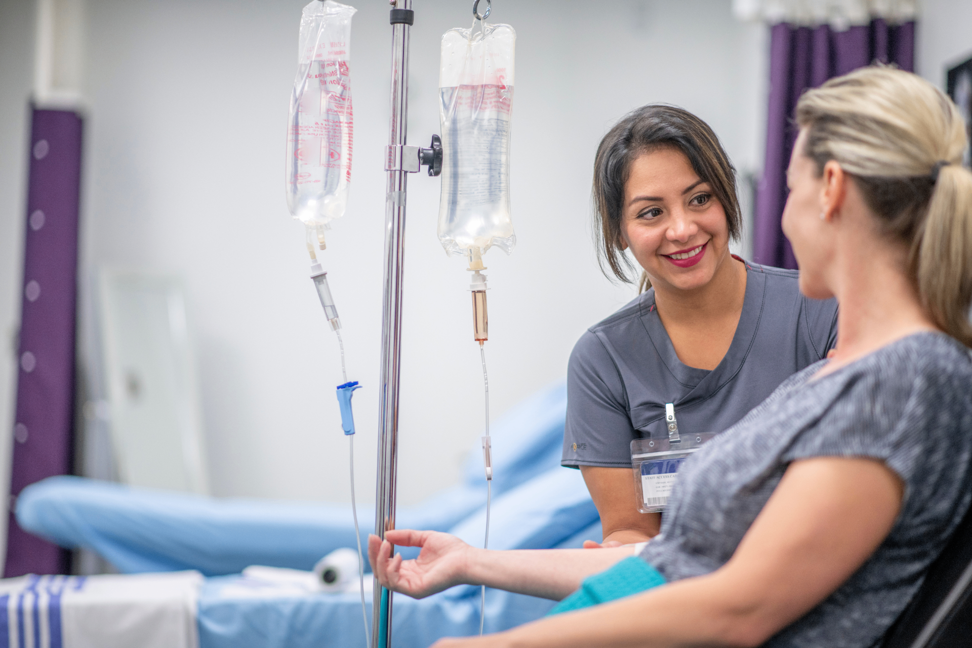 Registered Nurse with a guest during a stem cell IV infusion at iCRYO New Braunfels
